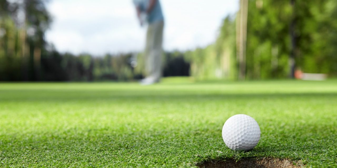 Playing golf